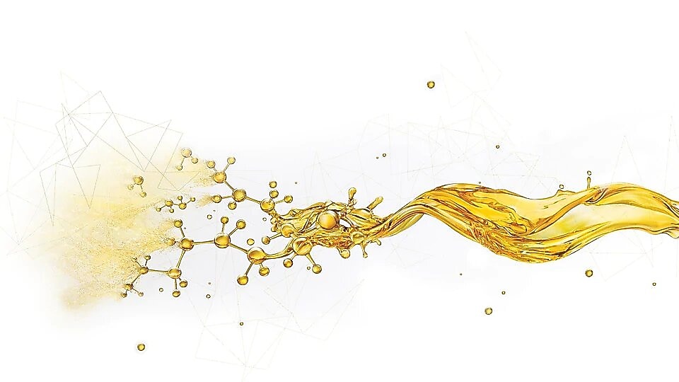 Salpicaduras de aceite rompiéndose en pequeños componentes