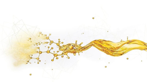 Salpicaduras de aceite rompiéndose en pequeños componentes