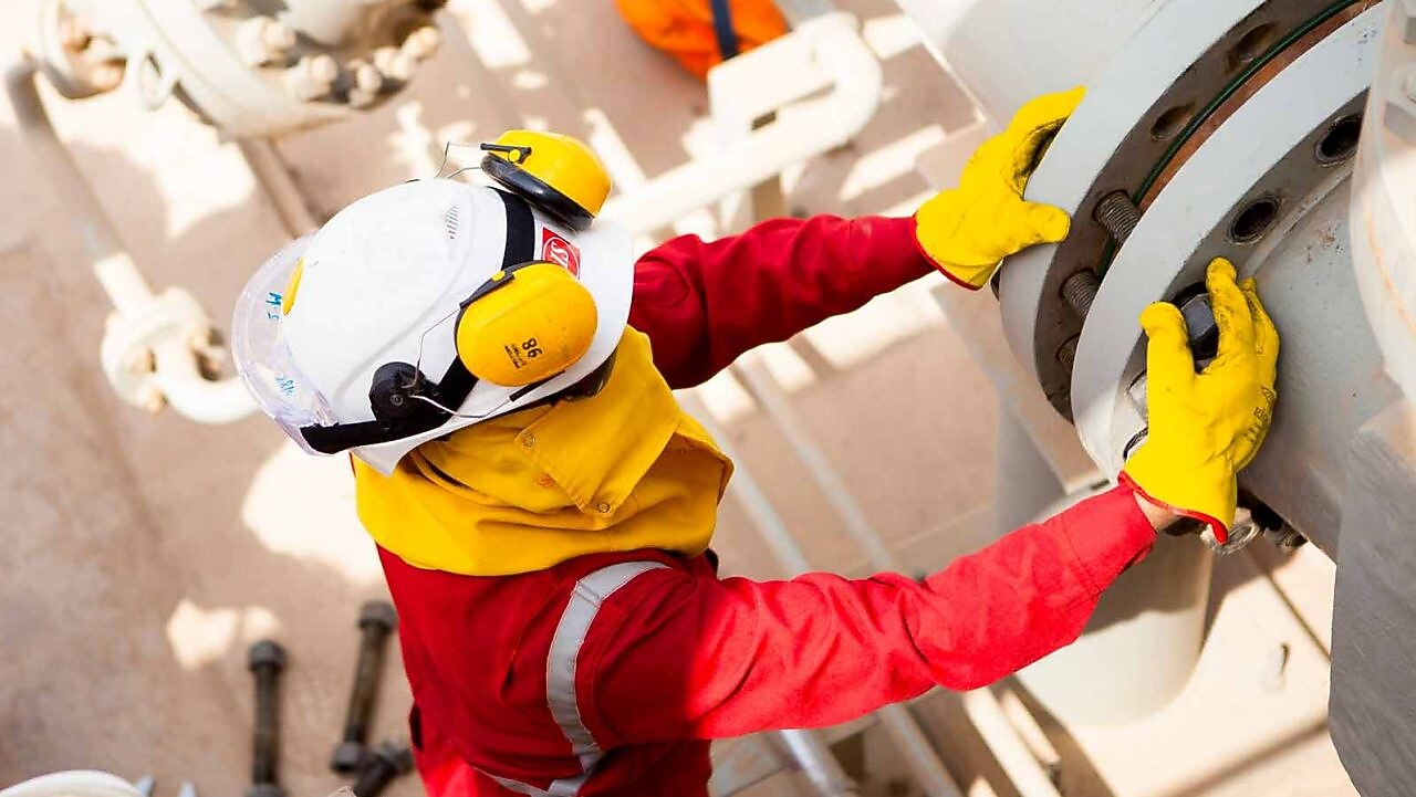 engineer-working-on-big-pipeline