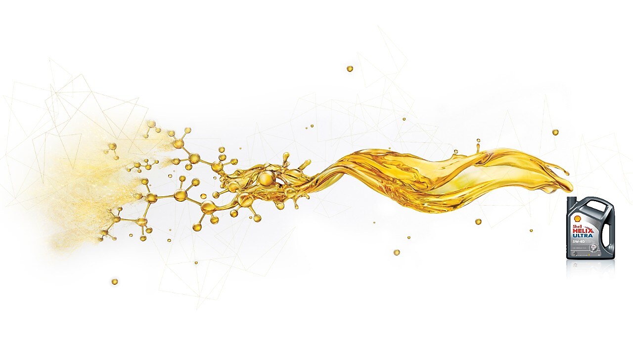 Salpicaduras de aceite rompiéndose en pequeños componentes