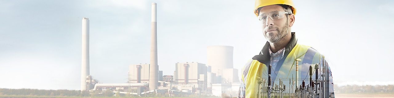 worker in a yellow hard hat transposed onto a background of a power plant