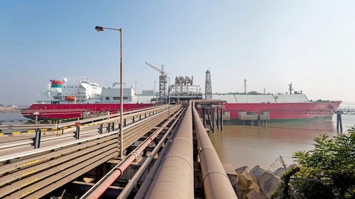 ship at the LNG jetty in port at the Hazira LNG receiving and re-gasification terminal